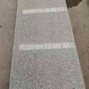 毕节芝麻白光面毛板